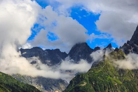Top of the mountain in the clouds. View of the Caucasus Range, Russia. Stock Photos