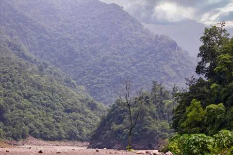 Top of the mountain covered with cloud and river in Rishikesh in Indian himal Stock Photos