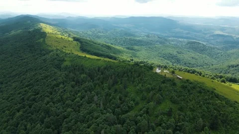 The top of the mountain with a small church. A small beautiful church on top of Stock Footage 283735044