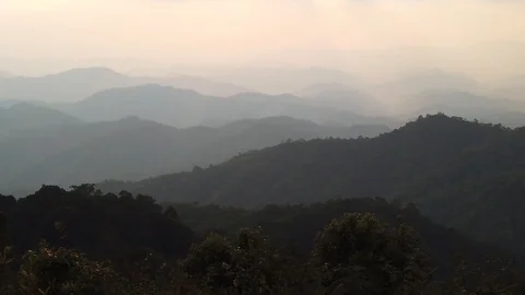 Top of mountain in sunrise soft light. Majestic nature landscape. Morning fog Stock Footage 111462339