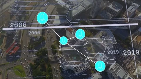 Top node appearing starting cyan nodes animating over city linking along 動画素材 333965129
