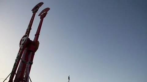 The top of a non operational ride at a carnival Stock Footage 154569529