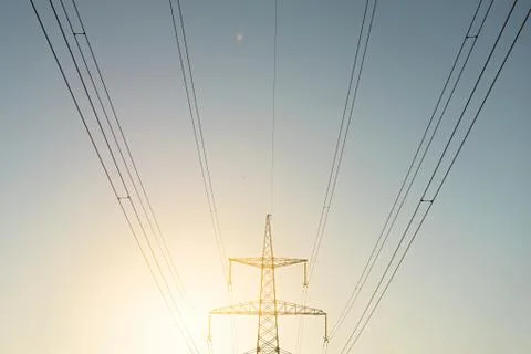 Top old electrical pillar on a background of the blue sky Stock Photos