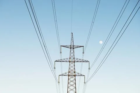 Top old electrical pillar on a background of the blue sky Stock Photos