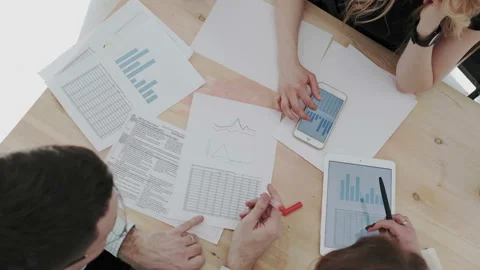 Top overhead view people group business analytic centre. Employees analyze Stock Footage 106202558