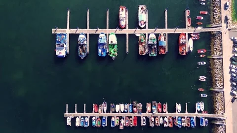 Top overhead view of port or harbour full of yachts, boats, sailboat. Видео 283493541