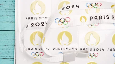 Top pan strap and labels printed with Paris Olympic Games 2024 logo Stock Footage 250002980