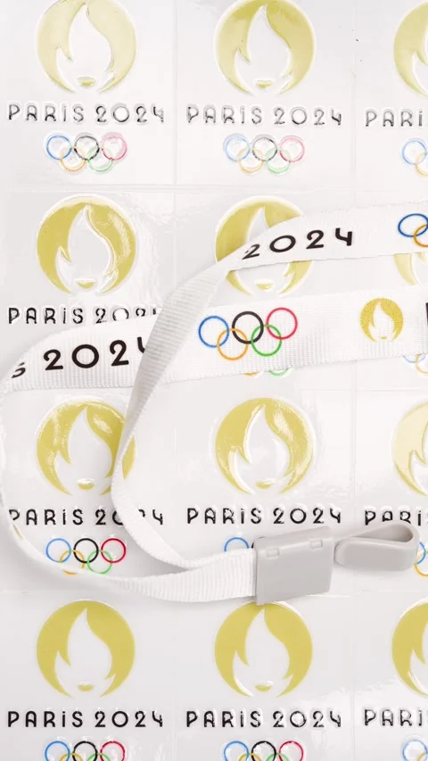 Top pan strap and labels printed with Paris Olympic Games 2024 logo Stock Footage 251092675