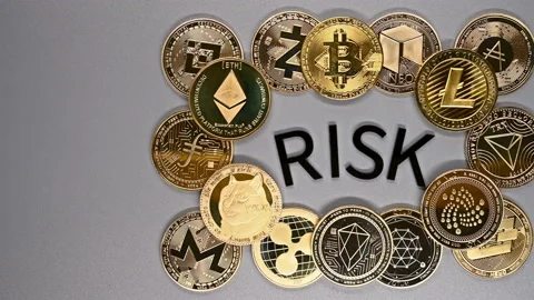 Top pan view bitcoin and ETH and doge coin etc with word of risk in the middl Stock Footage 154651034