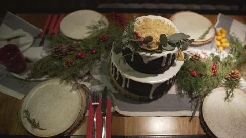 Top panorama view on marvelous decorated Christmas cake dinner table for New Yea Stock Footage 132676823