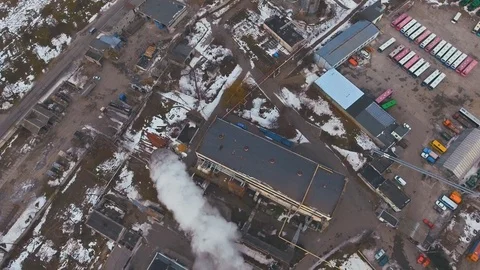 Top of the pipe with steam during the winter heating season (aerial shot). 4K Stock Footage 72133613