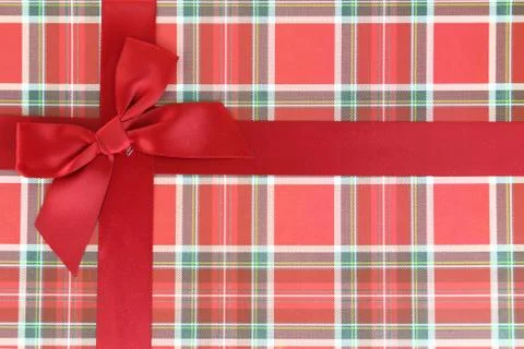 Top of present box with red ribbon Stock Photos