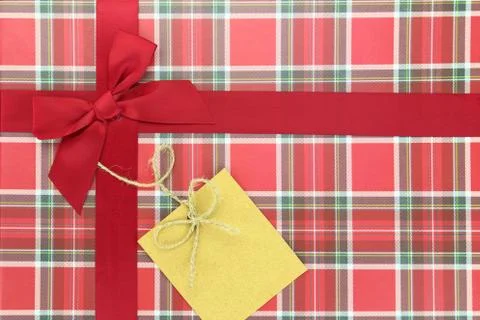 Top of present box with red ribbon Stock Photos