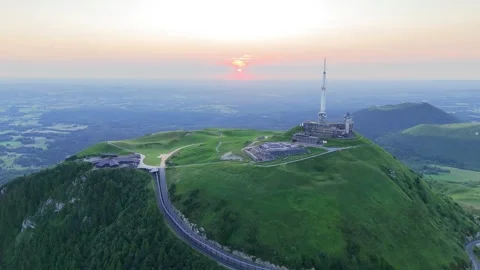 The top of Puy-de-Dôme mountain at sunset during summer, in Auvergne Video stock 297470886
