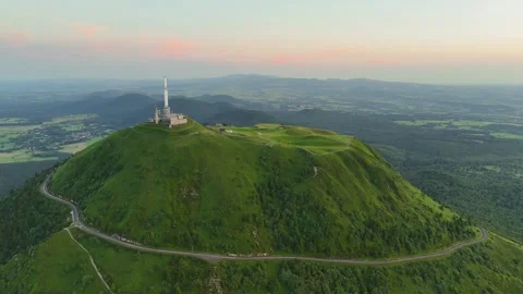 The top of Puy-de-Dôme mountain at sunset during summer, in Auvergne France Video stock 297470898