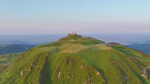 The top of Puy-de-Dôme mountain at sunset during summer, in Auvergne France Video stock 297470899