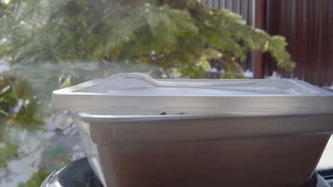 Top ramen is brewed by the window. Brewing instant noodles Stock-Footage 149223024