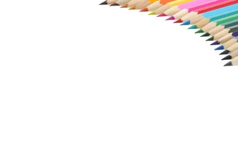 Top right corner border of multi colored pencils with copy space Stock Photos