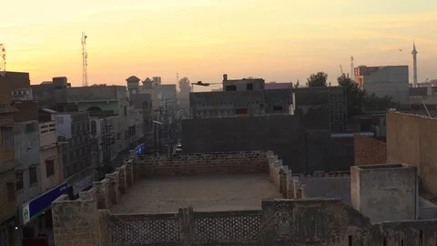 Top of Roof view of City at sunset. Stock Footage
