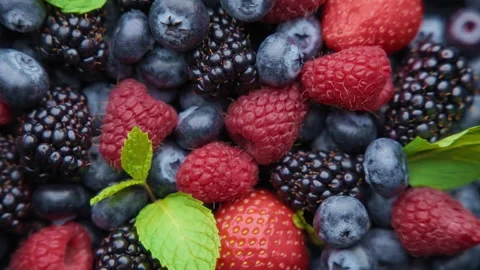 Top rotating view of fresh organic mix of berries Stock Footage 276389879