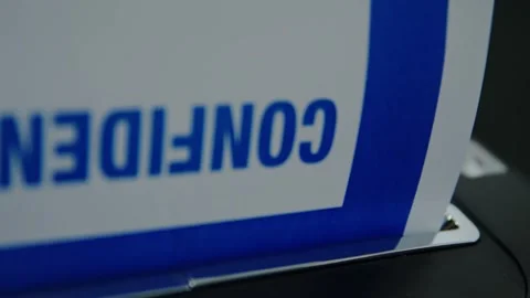 Top Secret Confidential Document Coversheet Fed into Paper Shredder Stock Footage 327398969