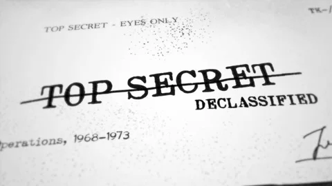Top secret document is crossed and marked declassified for public domain release Stock Footage 304633762