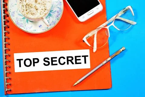 Top secret. The text label on the folder with confidential documents. Stock Photos