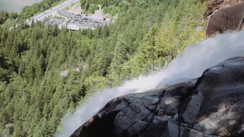 Top of Shannon Falls looking down on the Sea to Sky Gondola base 4K 스톡 동영상 132205432
