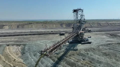 Top shot of a large bucket-wheel excavator in a lignite (brown-coal) mine Stock Footage 248028048