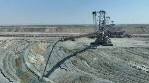 Top shot of a large bucket-wheel excavator in a lignite (brown-coal) mine Stock Footage 286105572