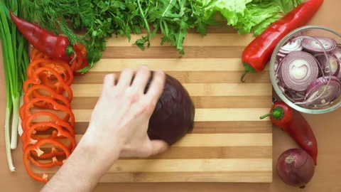 Top shot of man chef cutting cabbage on chopping wooden board Stock Footage 88167319