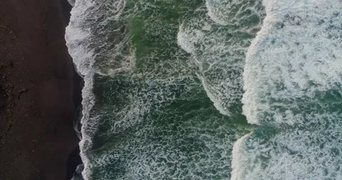 Top Shot Ocean Waves Rolling in Continuous Motion Along Sandy Shore Stock Footage 332150685