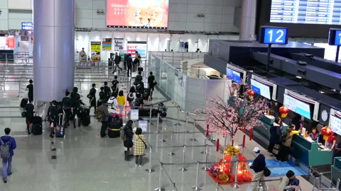 Top shot of passengers going to the China airline check in desks Stock Footage 102006162