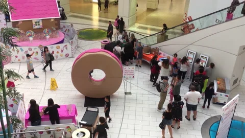Top shot of people lining up for taking a ticket to enter a free tasty treat. Stock Footage 237804858