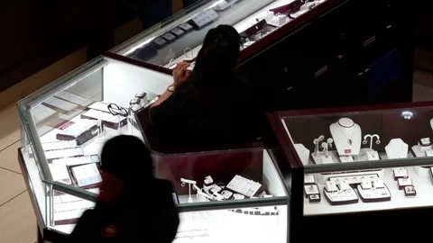 Top shot of people walking through jewelry store inside Burnaby shopping mall Stock Footage 73502640