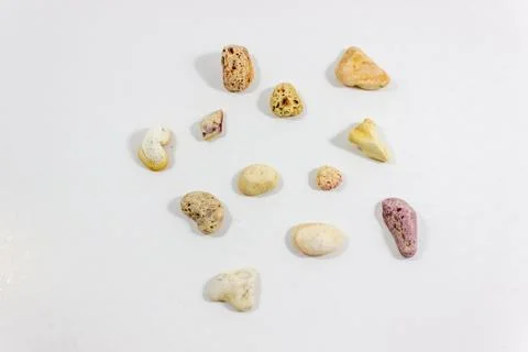 Top shot of several random positioned colorful stones that collected from bea Foto stock