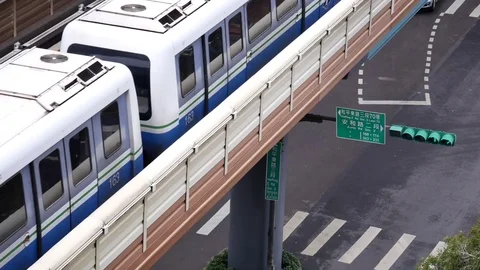 Top shot of skytrain passing by building during rush hour in Taipei Taiwan 스톡 동영상 81377712