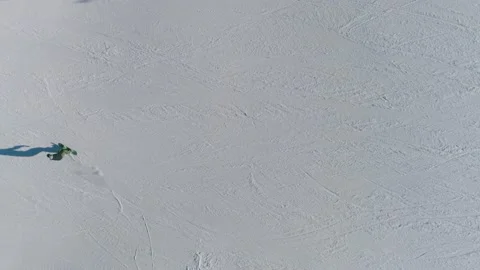 Top shot of a snowboarder in slow motion Stock Footage 222362748