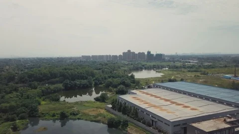 Top side flight over the Beer Factory in China, Sichuan Province Stock Footage 115923391