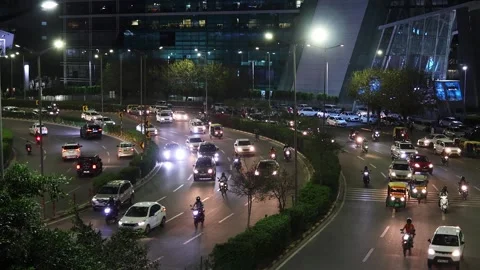Top side view of busy evening road traffic on Raghvendra Marg Video stock 294576782