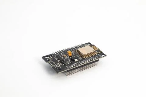 Top side view of an IOT (Internet of Things) module being held in hand. This  Stock Photos