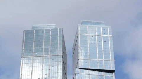 Top of skyscrapers with clouds reflection, time-lapse Stock Footage 8692485