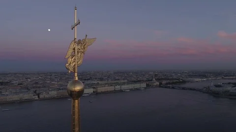 The top of the spire of the Peter and Paul Fortress - an angel with a cross in Stock Footage 76880906