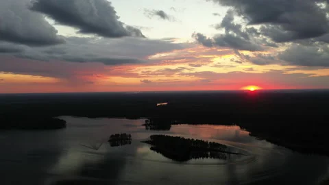 Top static view of the sunset lake landscape with sky reflection Stock-Footage 147057577