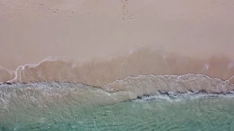 Top straight down aerial view above sandy beach Stock Footage 137659290