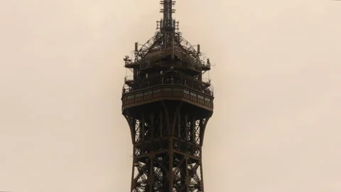 Top Summit of Eiffel Tower in City of Paris on Cloudy Day, Zoomed View Stock Footage 242016040