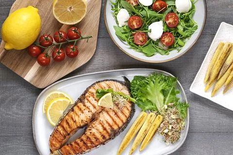 Top table view of grilled salmon steak. Stock Photos