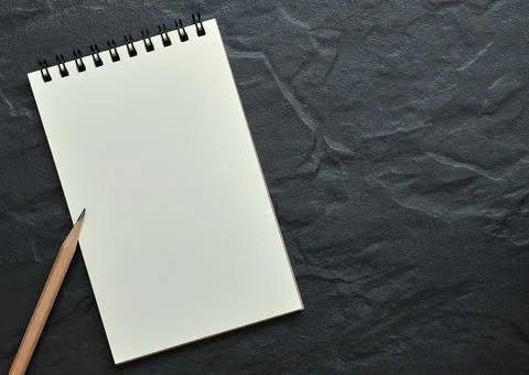 Top Table View, Open Blank Spiral Notebook On Black Background, Copy Space 写真素材