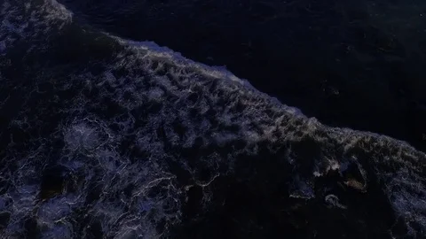 Top tracking view of crashing waves Stock Footage 82870576