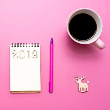 Top view 2019 list with notebook, cup of coffee Stock Photos